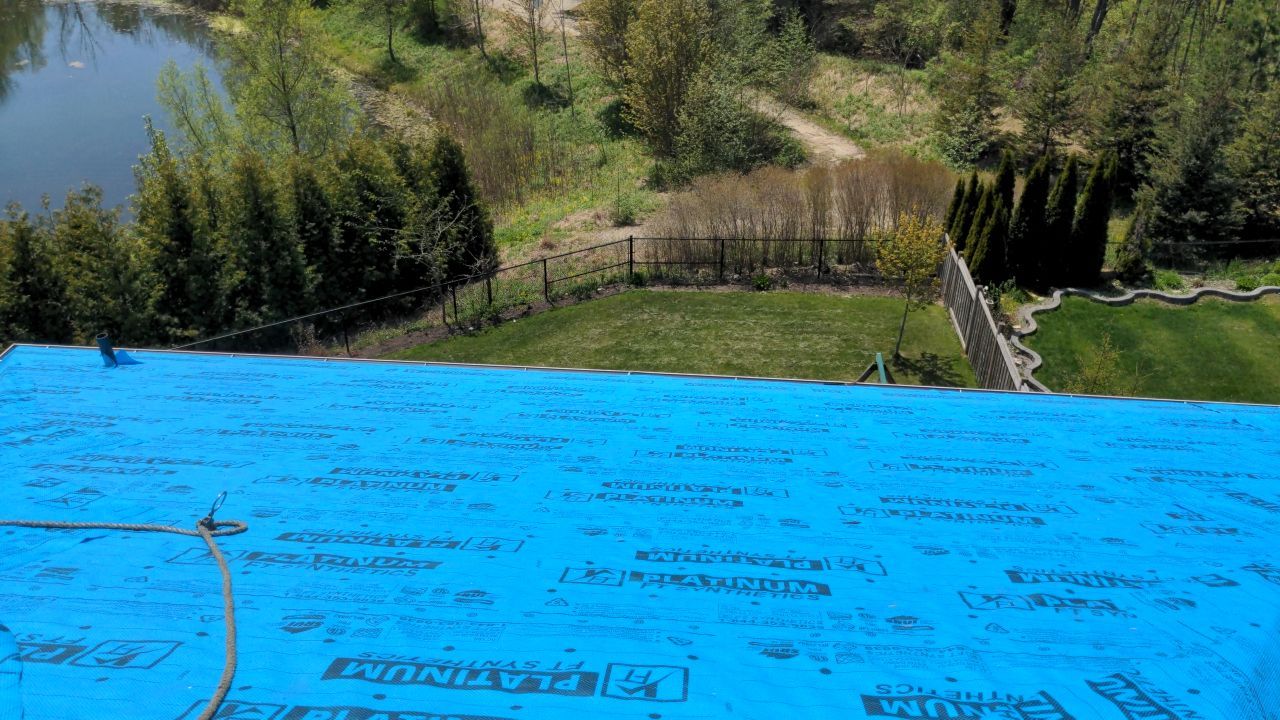 Residential Roofing Installation using 16" Standing Seam Panels by Jay Carter Roofing & Sheet Metal