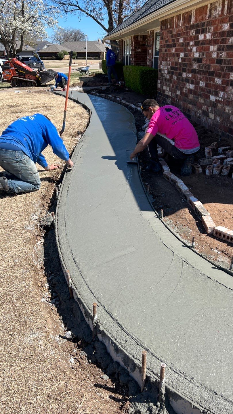 Concrete sidewalk using Concrete by Clays Services Inc