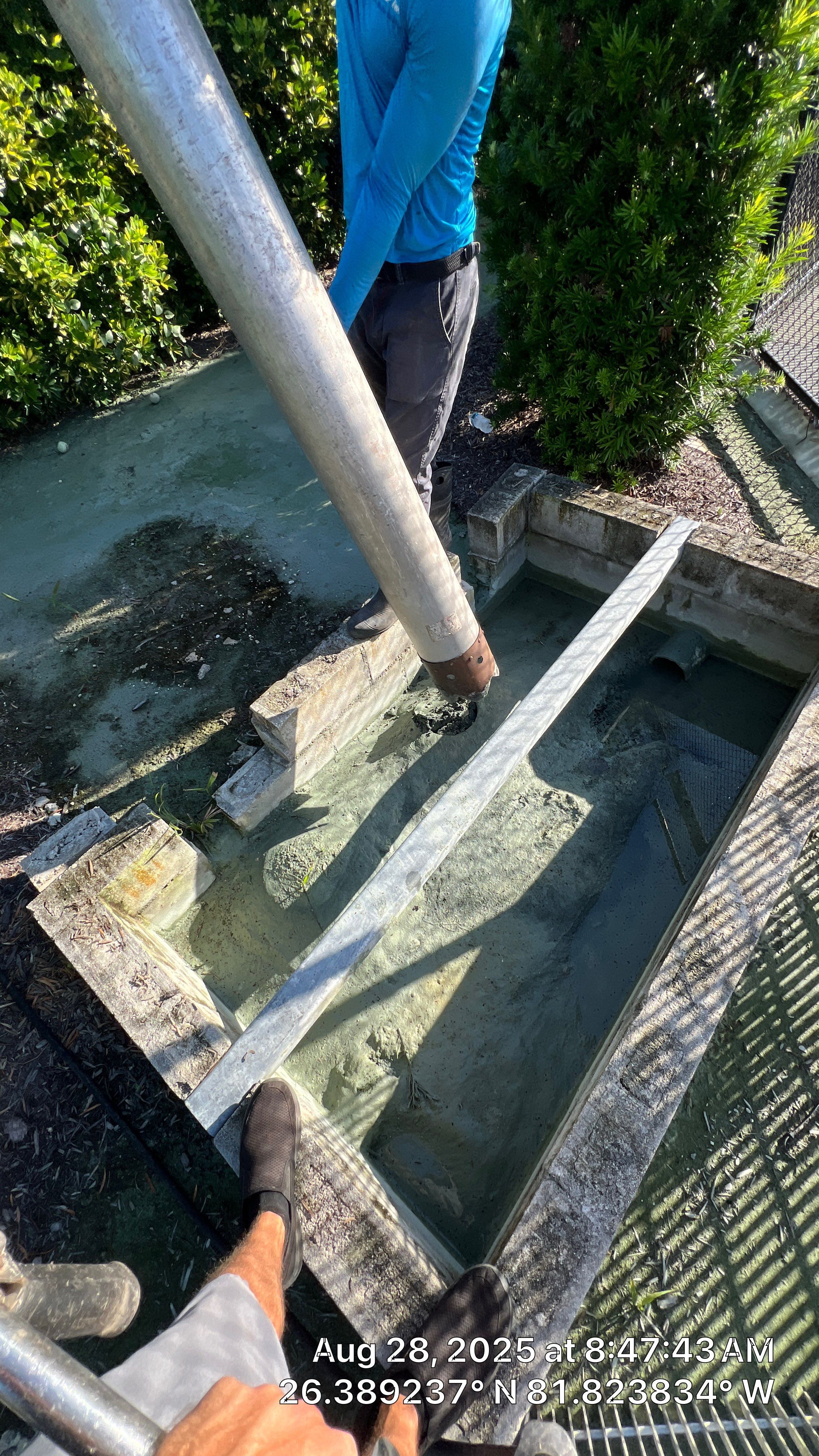 Pelican Landing Tennis Court Catch Basin Cleaning by APS Power & Water