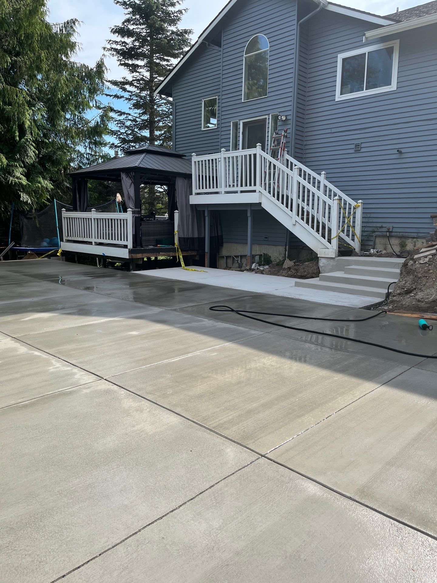 Concrete Back Patio Makeover  by Jireh Asphalt & Concrete Inc 