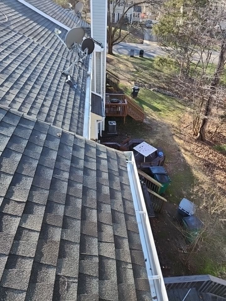 Gutter Cleaning using water by Power Wash Masters LLC