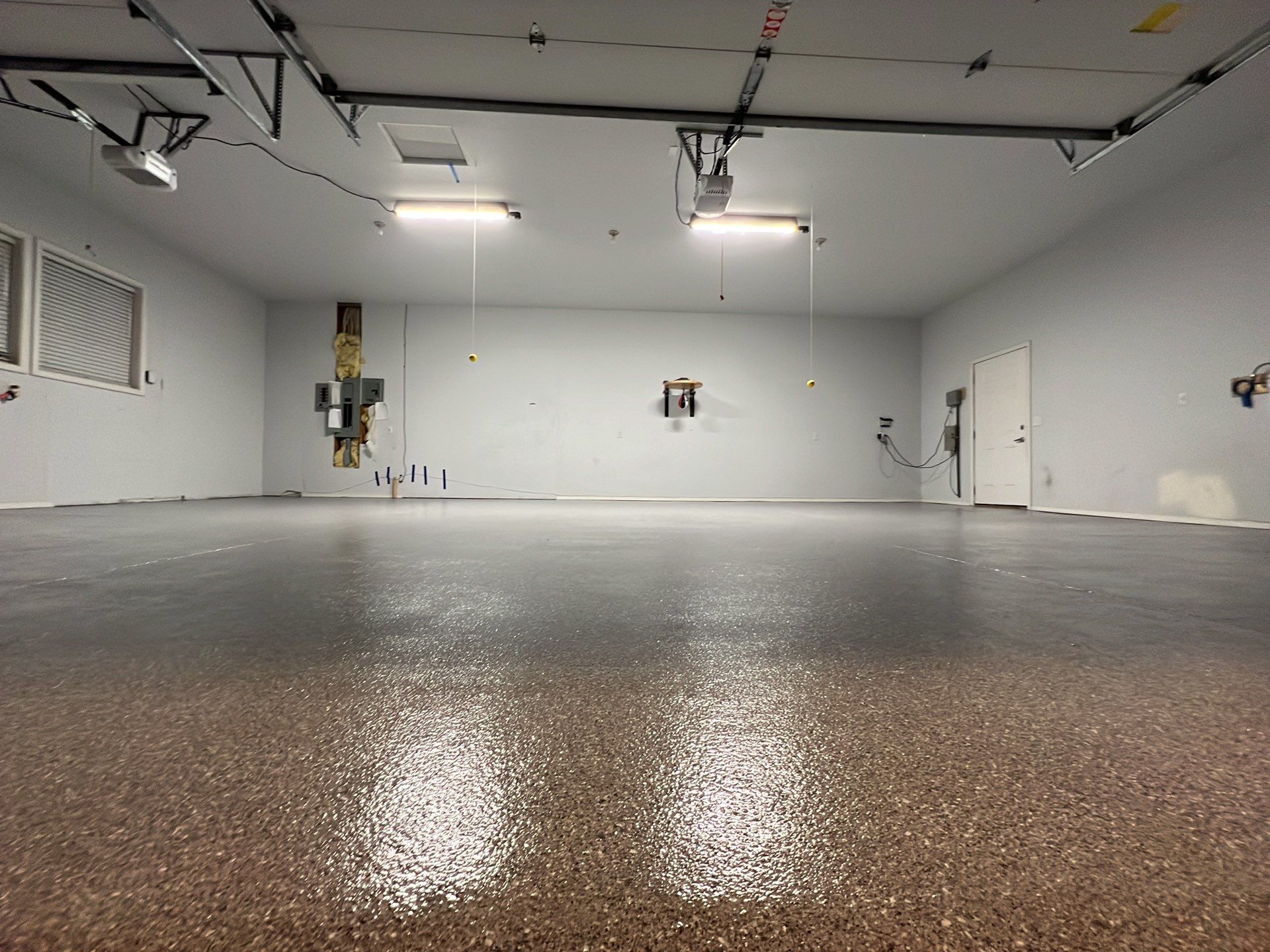 Garage Transformation using Canfield Hybrid & Grey Croc Cabinets by Croc Coatings, LLC