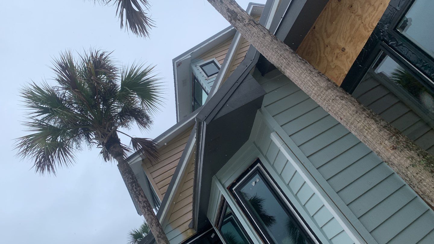 Seamless Gutter Installation using Charcoal Grey Gutters by Gutter Professors