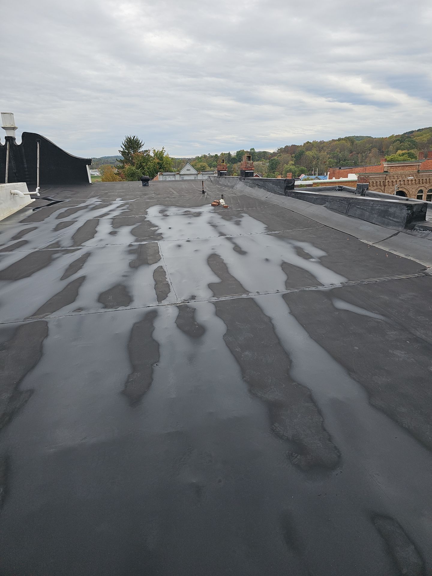 Western Auto  by 768 ROOF, LLC.