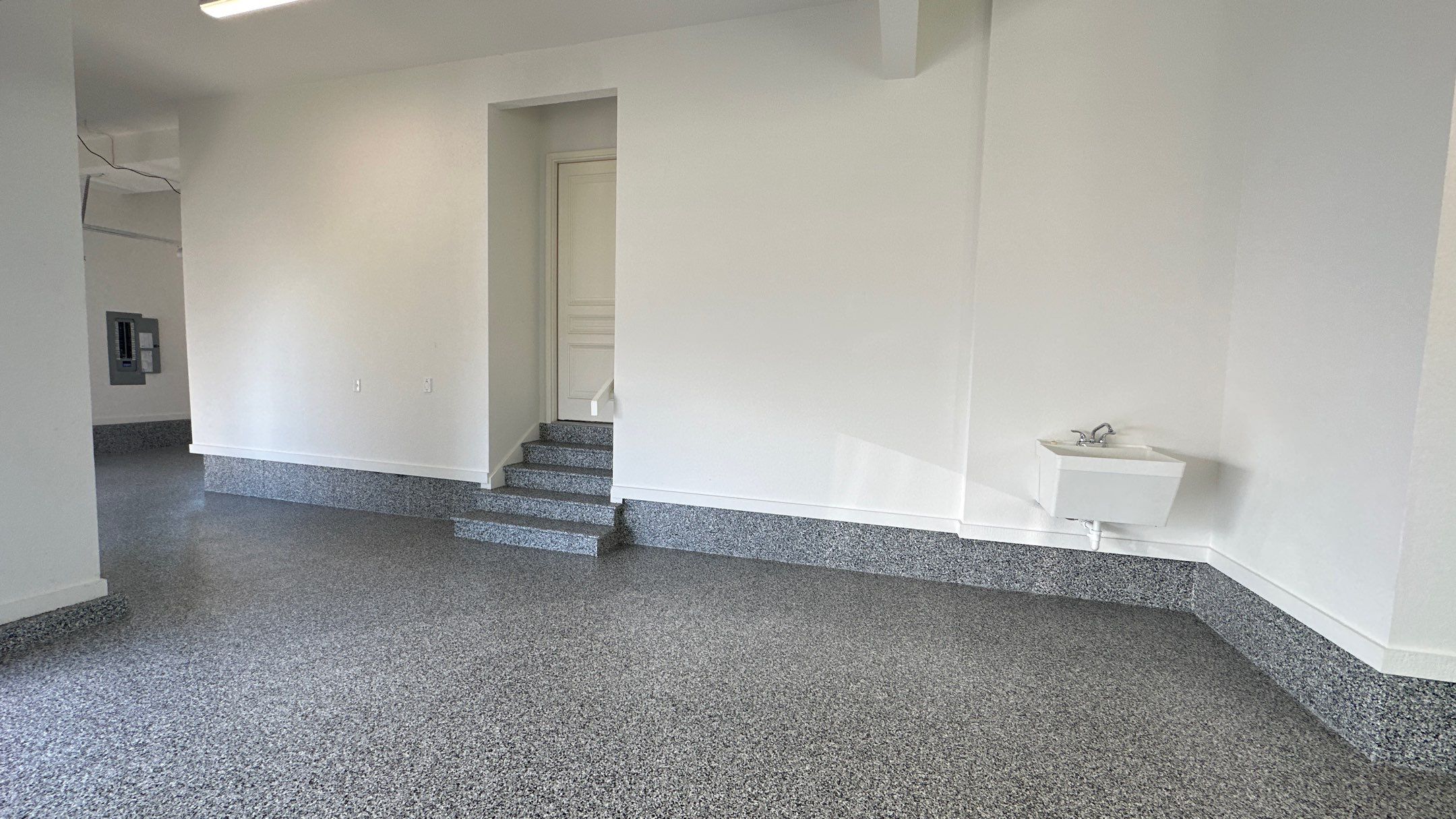 Mike & Pam transformed their garage with a Banner Garage Floor and Cabinets by Banner Garage
