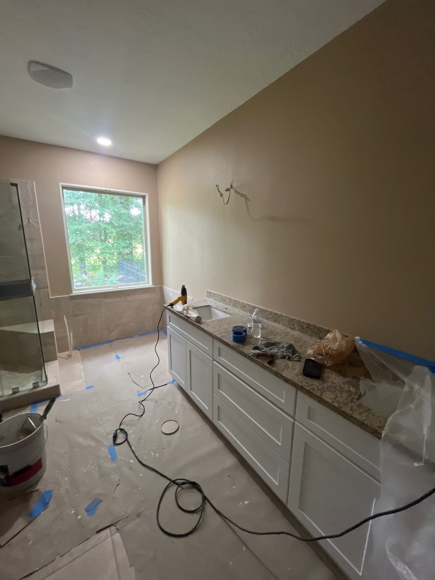 Bathroom Remodel using Water mitigation equipment by L&T General Contractors and Restoration INC