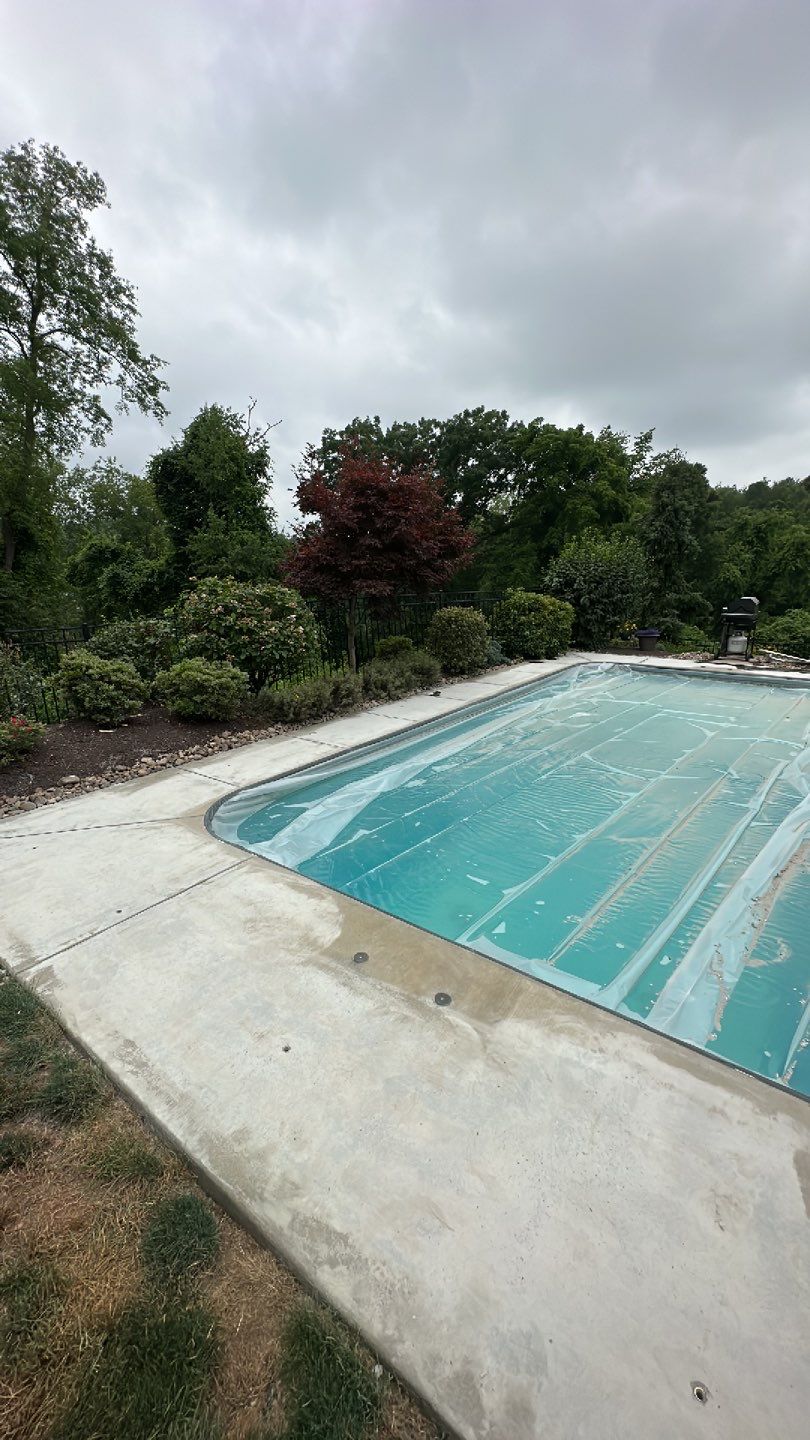 Pool Deck + Driveway + Garage Project in Venetia by Floors in a Day, Inc
