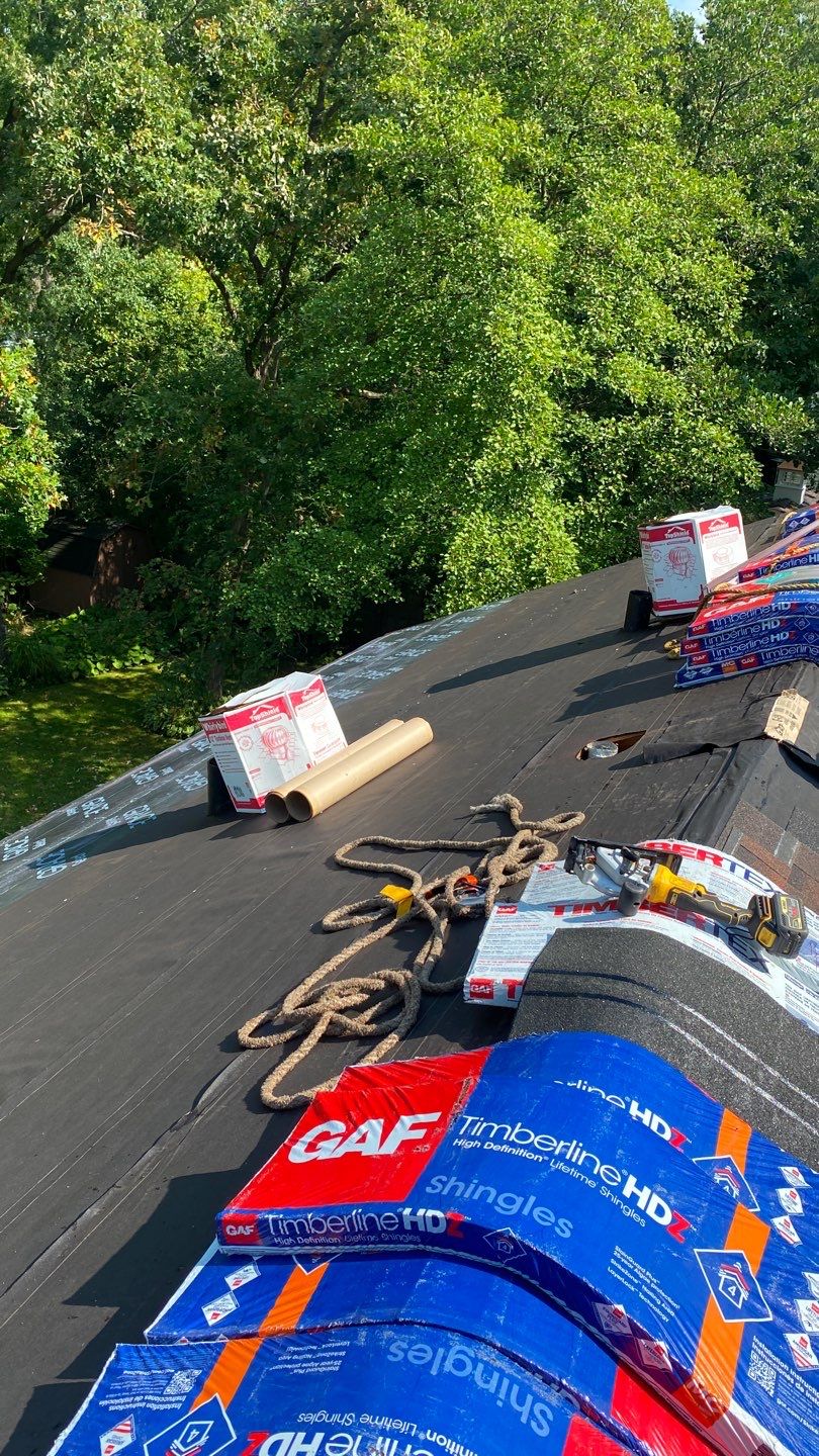 Asphalt Roof Replacement with Half Round Copper Gutter Installment  by Custom Installations