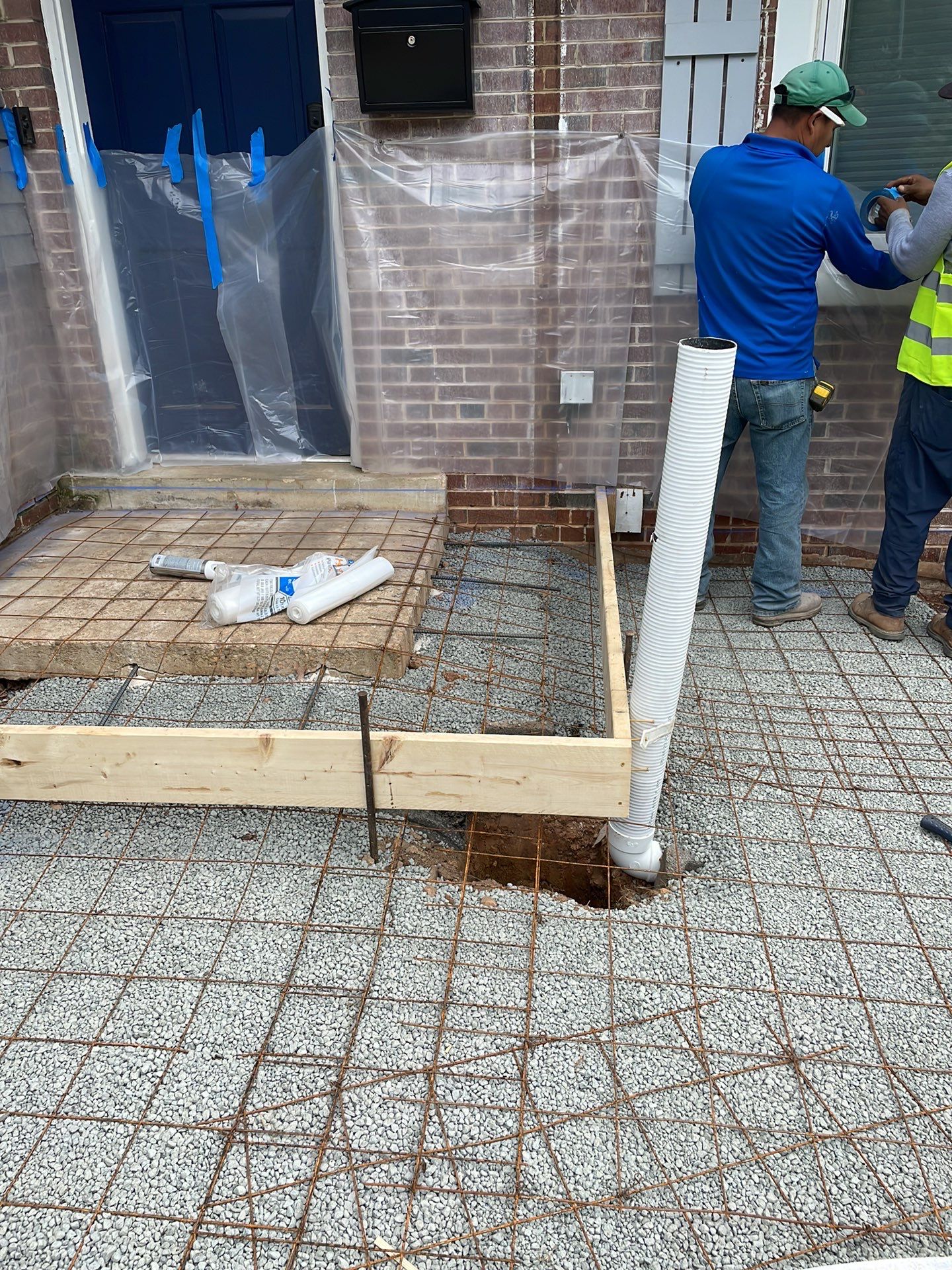 New walkway with stairs and a new front porch by Fairfax Contractors, LLC