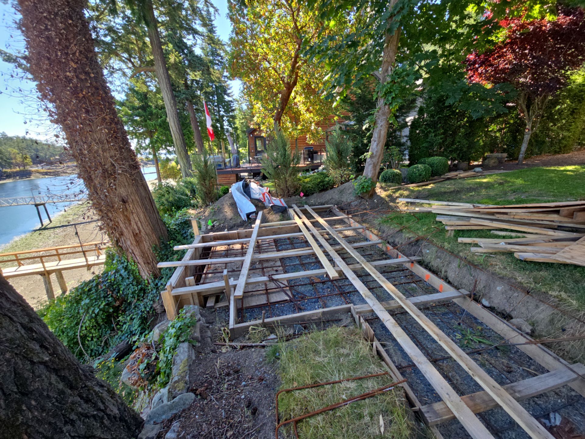 Coastal Landscape Restoration & Retaining Structure - In progress by Habanero Garden and Exterior Care