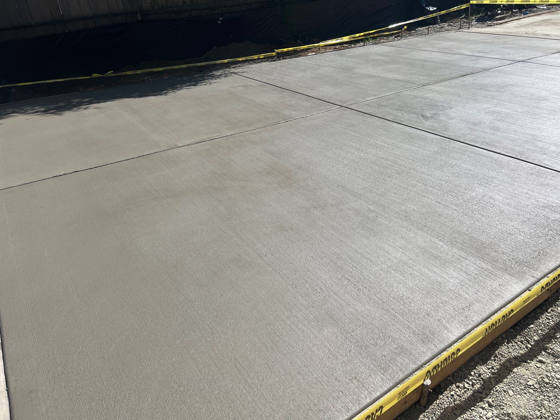 Grant | Concrete Driveway  by Jireh Asphalt & Concrete Inc 