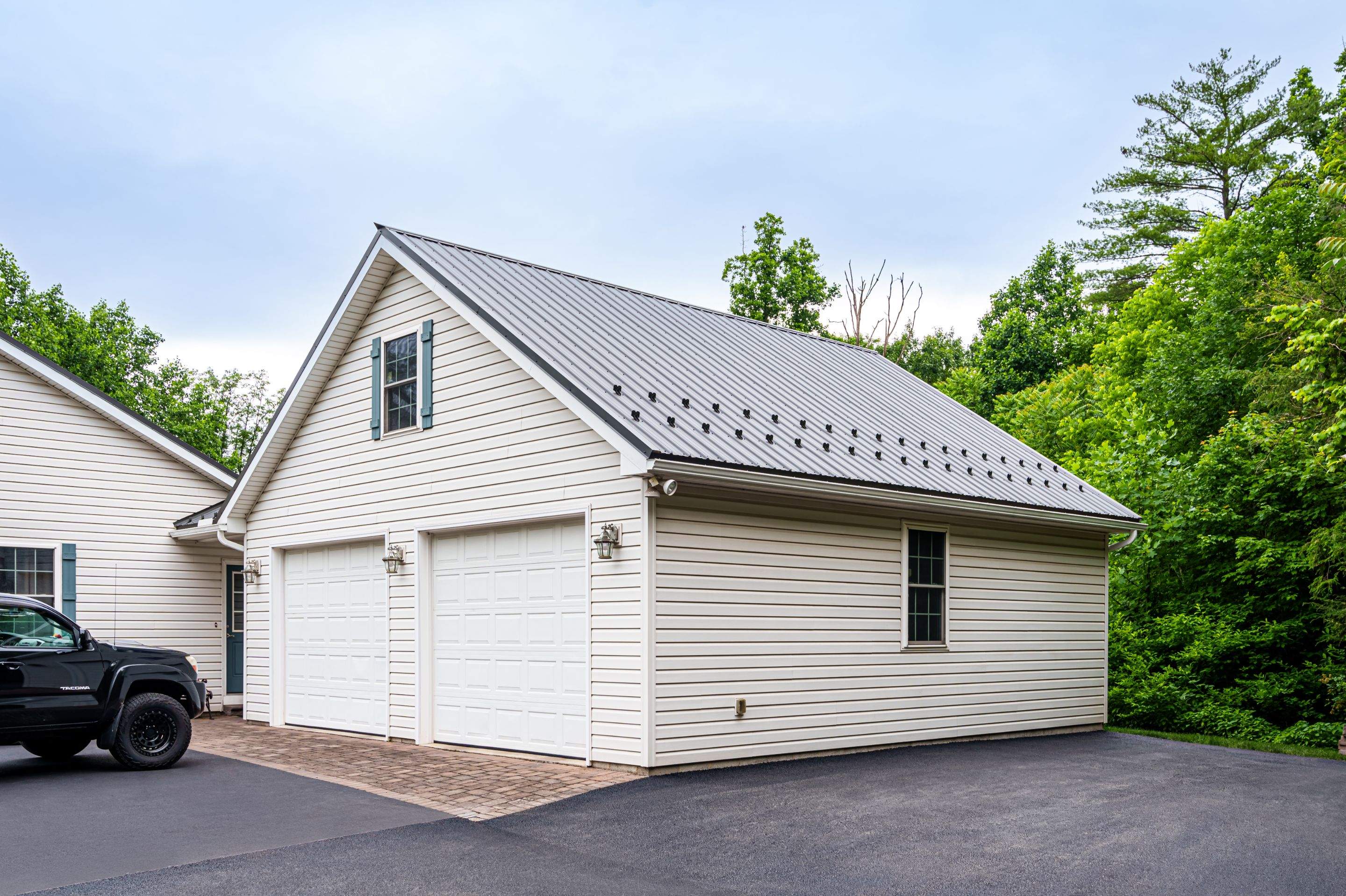 Metal roof install- shadow gray by Esh Builders