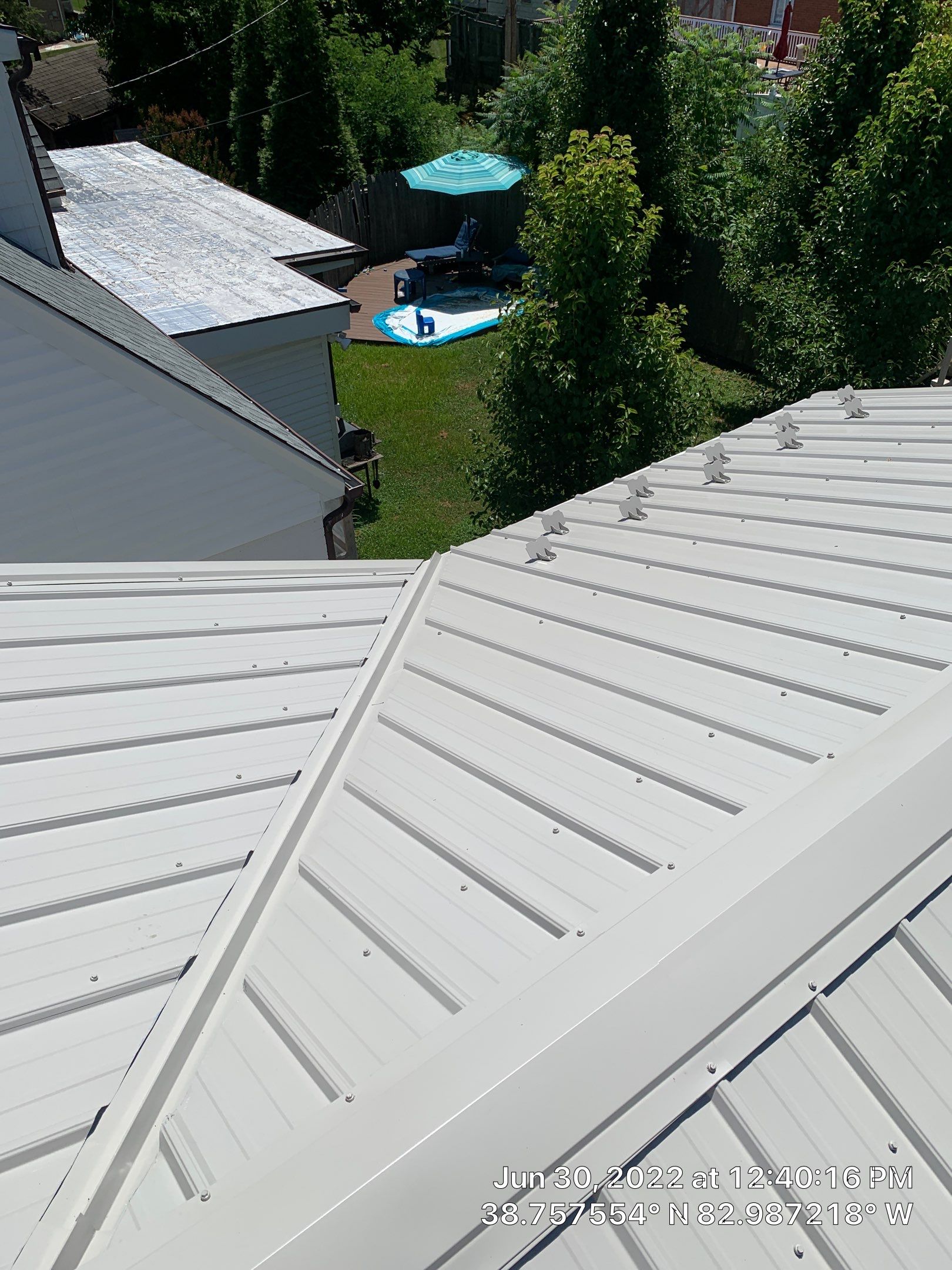 Metal Roofing, Skylights, Porch Build by Secure Construction Company Inc