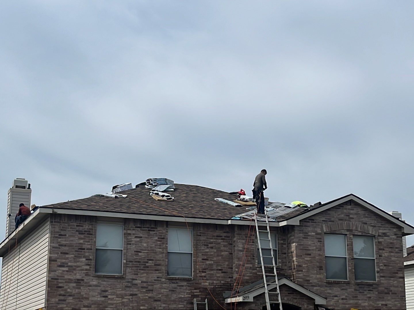 Full Roof Replacement, Chimney Rebuild and Interior Damage Replacement by First United Roofing & Construction