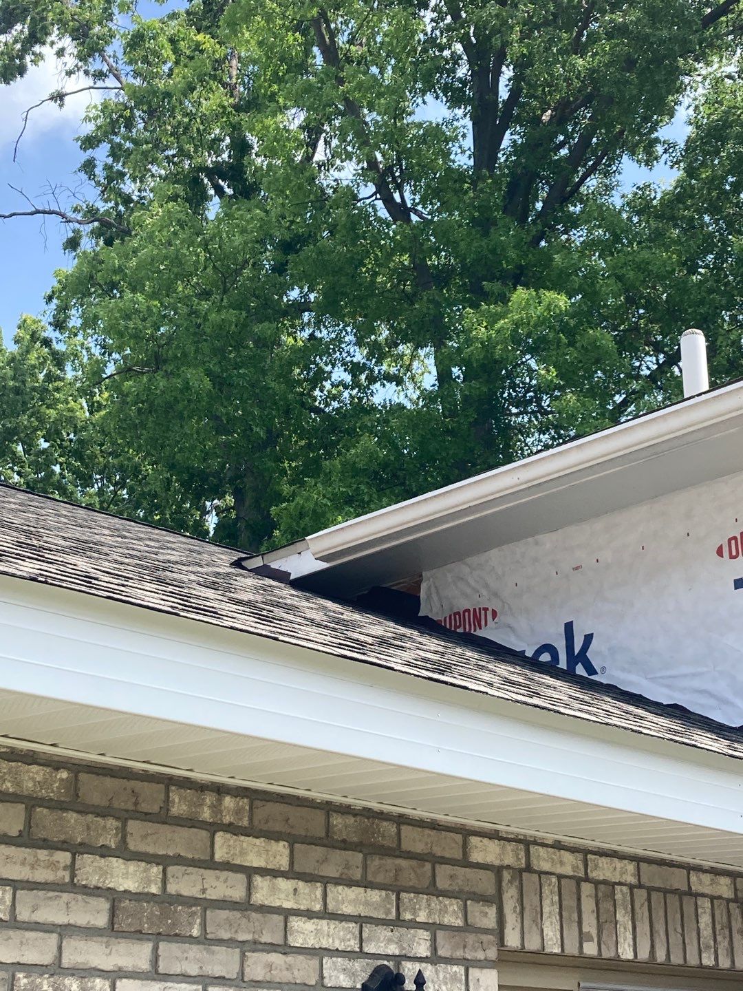 Gutter Installation using 5" Seamless Aluminum Gutters by Absolute Roofing and Construction