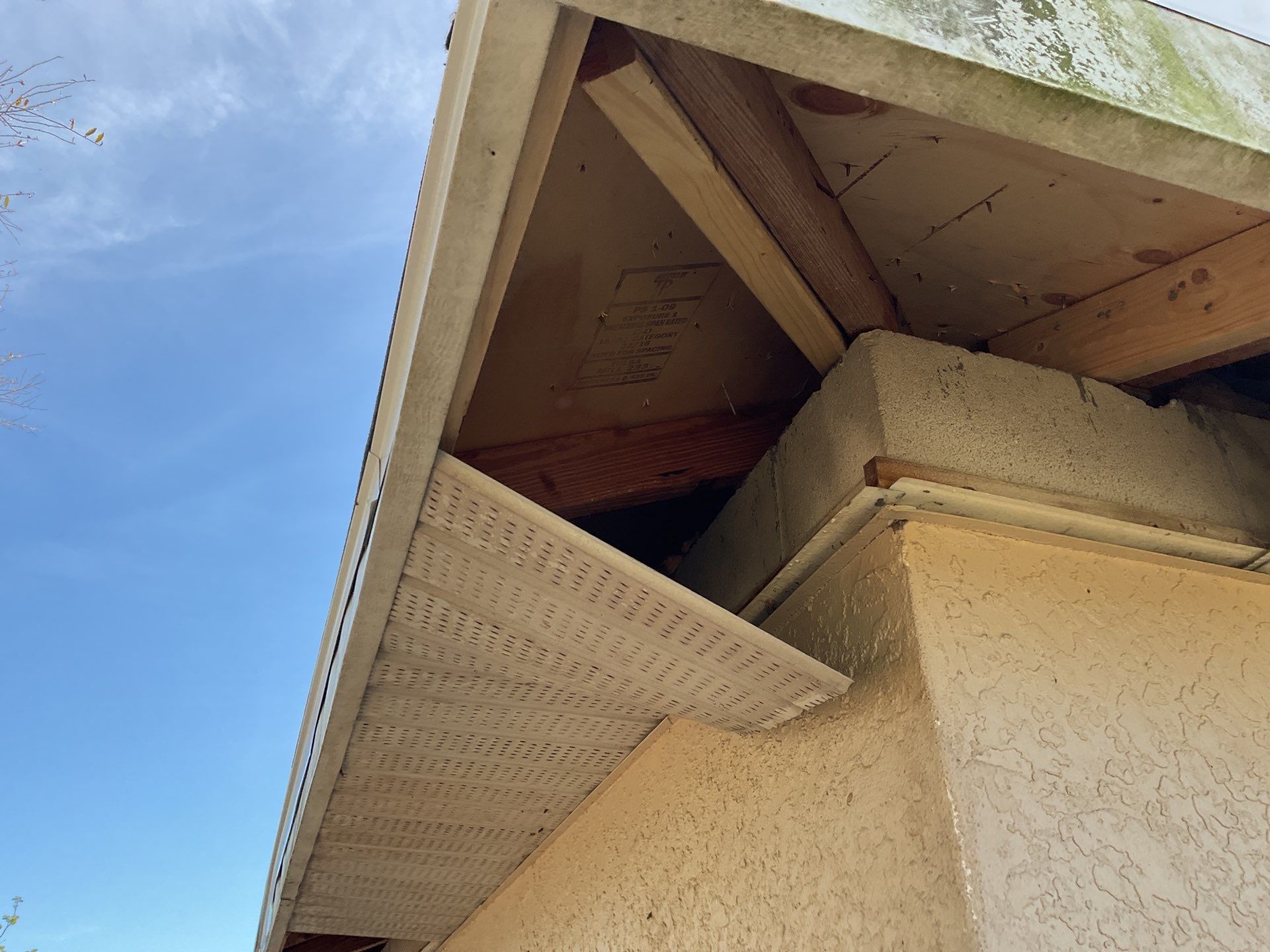 White Seamless Gutters and Soffit Installation in Cape Coral FL by Gutter Professors