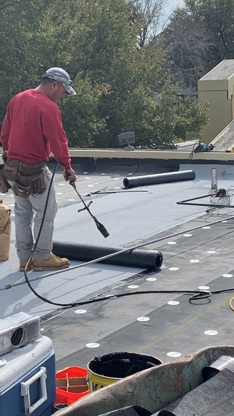 Apartment Roof Replacement by First Out Roofing 