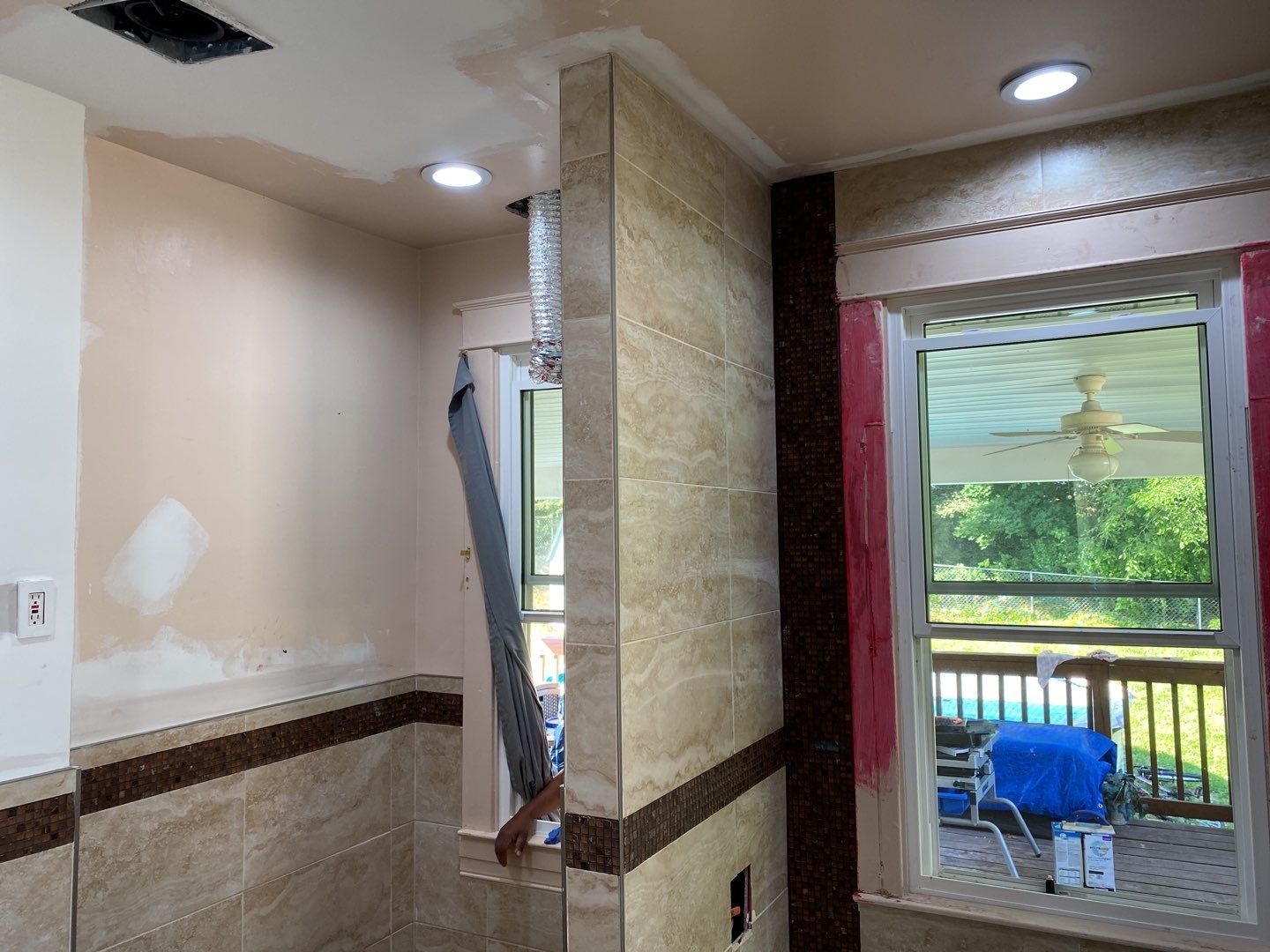 Bathroom Remodel using New Bathroom Tile and Tube by Alpha Design Services