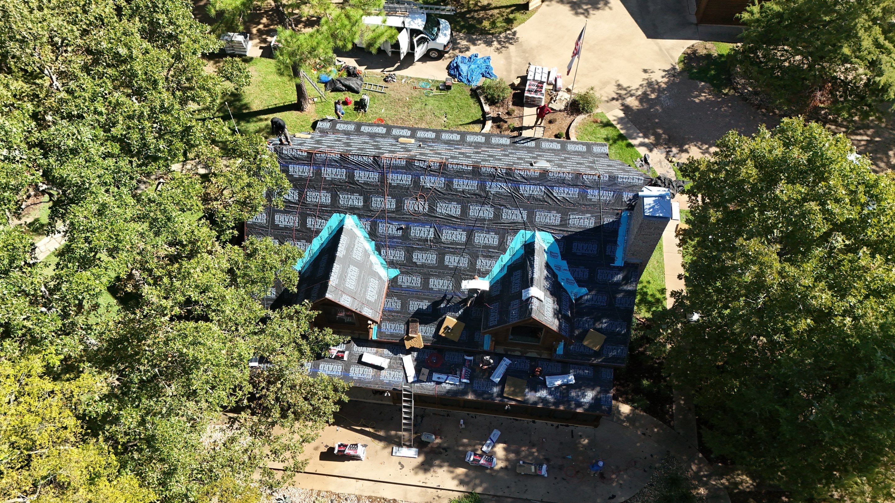 Multi-Building Log Cabin Roof Replacement with Architectural Shingles in Quitman by Armor Roofing | Exteriors