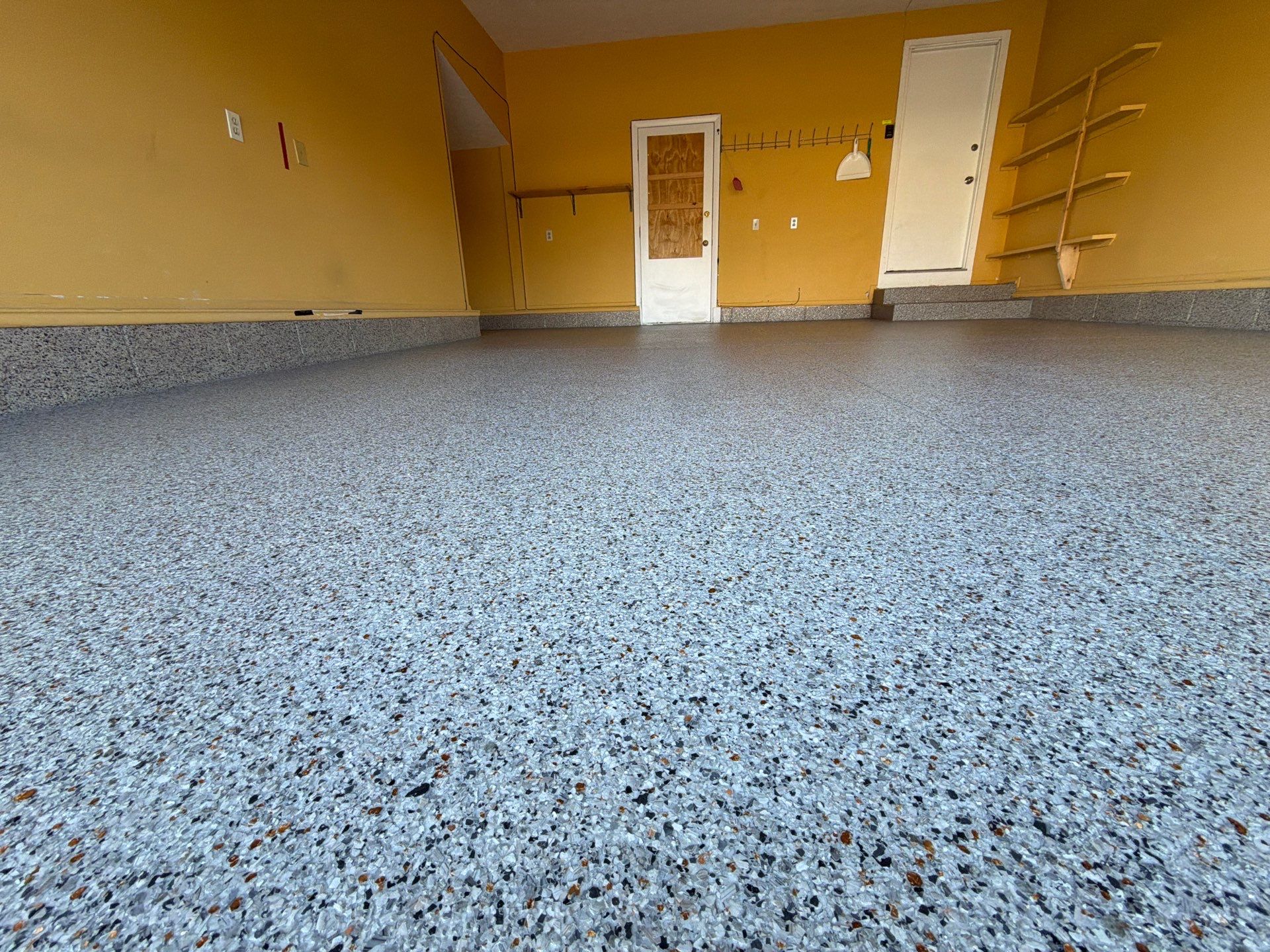 Vintage Goldmine Garage Coating by NG Masonry & Construction LLC