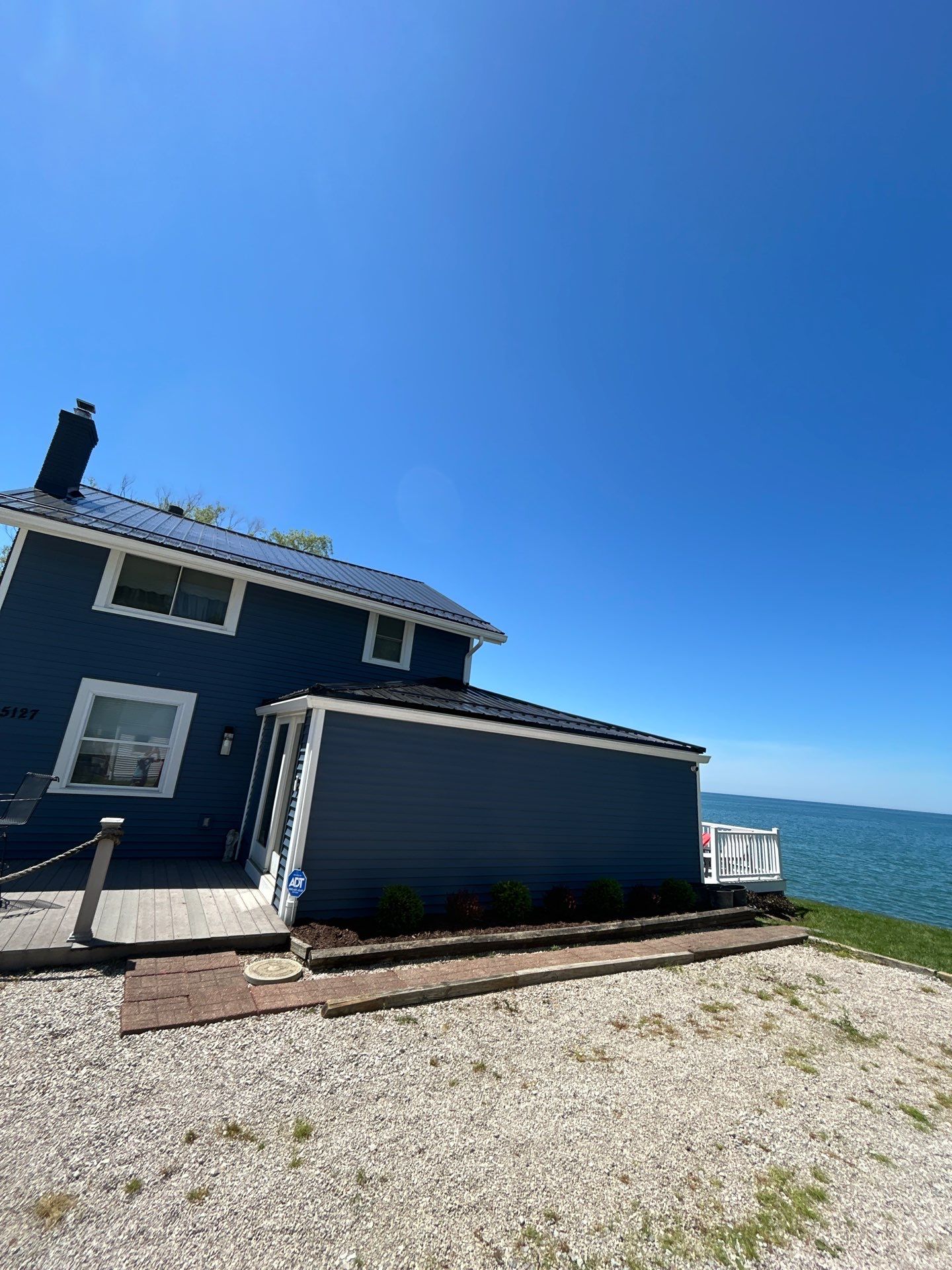 Metal Roofing, Siding, Windows & Gutter Installation by Pally Roofing