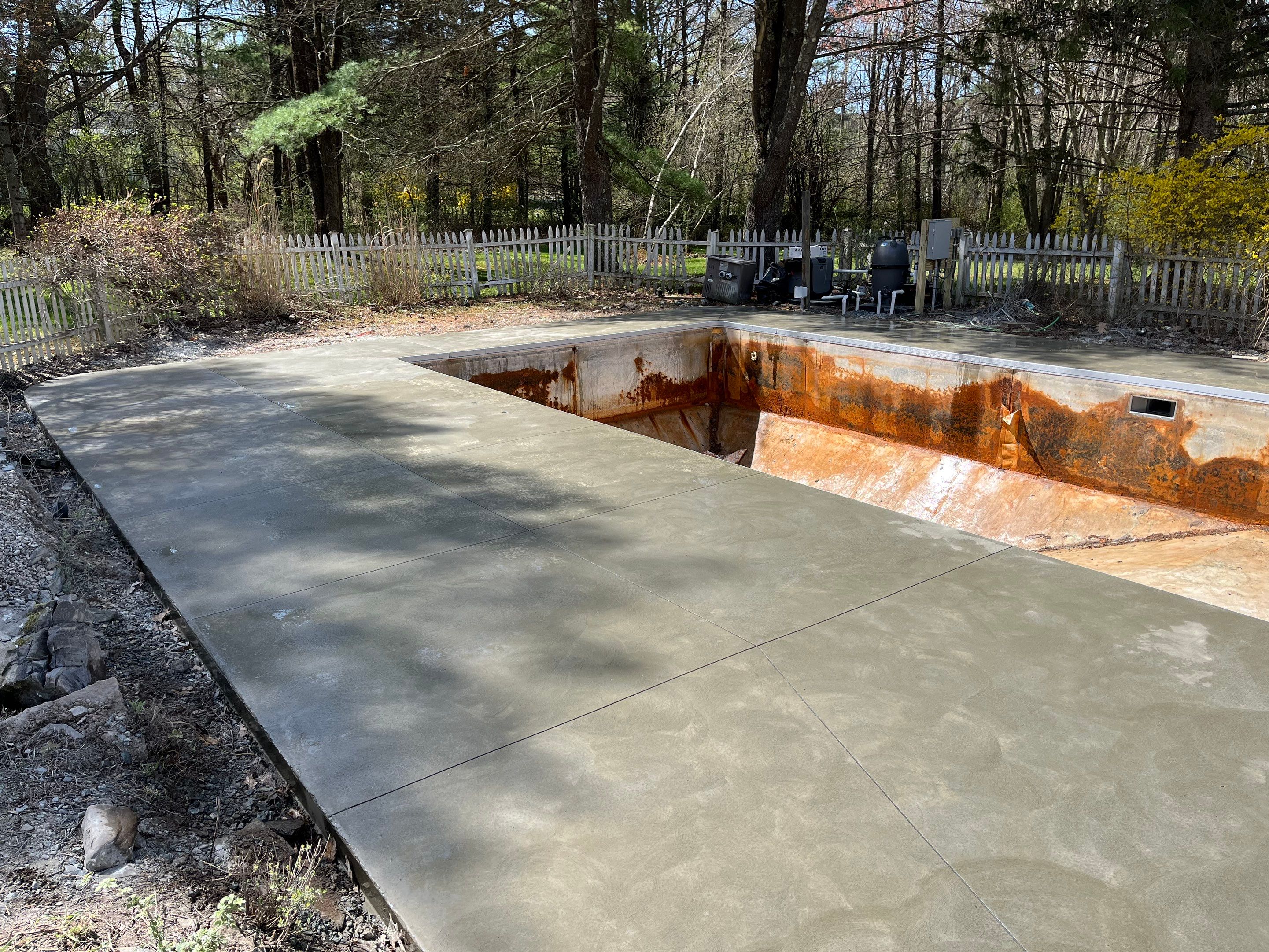 In-Ground Swimming Pool Renovation and Concrete Decking in Old Chatham by Cypress Pools and Spas