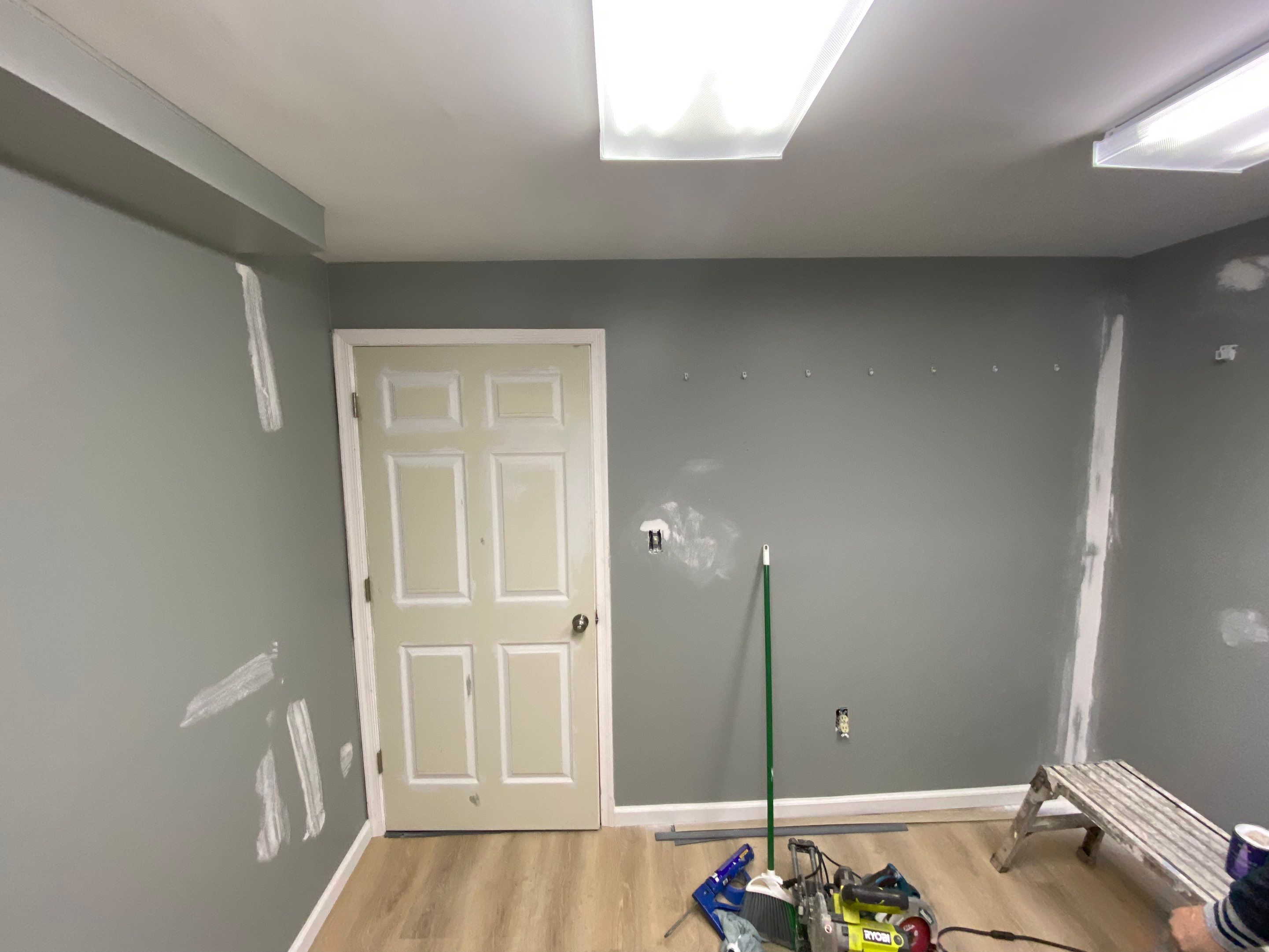 Laundry Room Redmodel using Lifeproof Luxury Vinyl Plank Flooring by The Smet Companies, LLC
