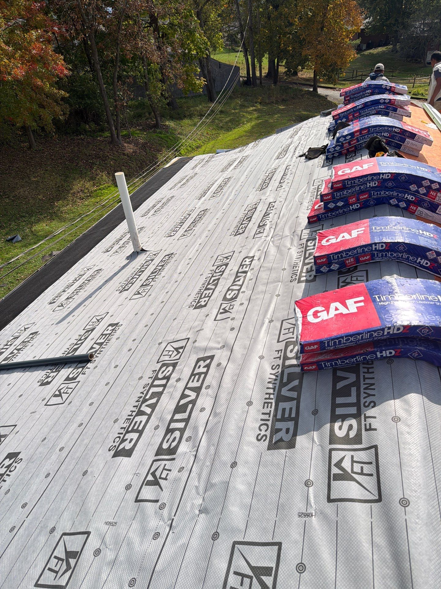 Residential Roofing Installation using GAF Timberline HDZ Shakewood by Rainstoppers Roofing