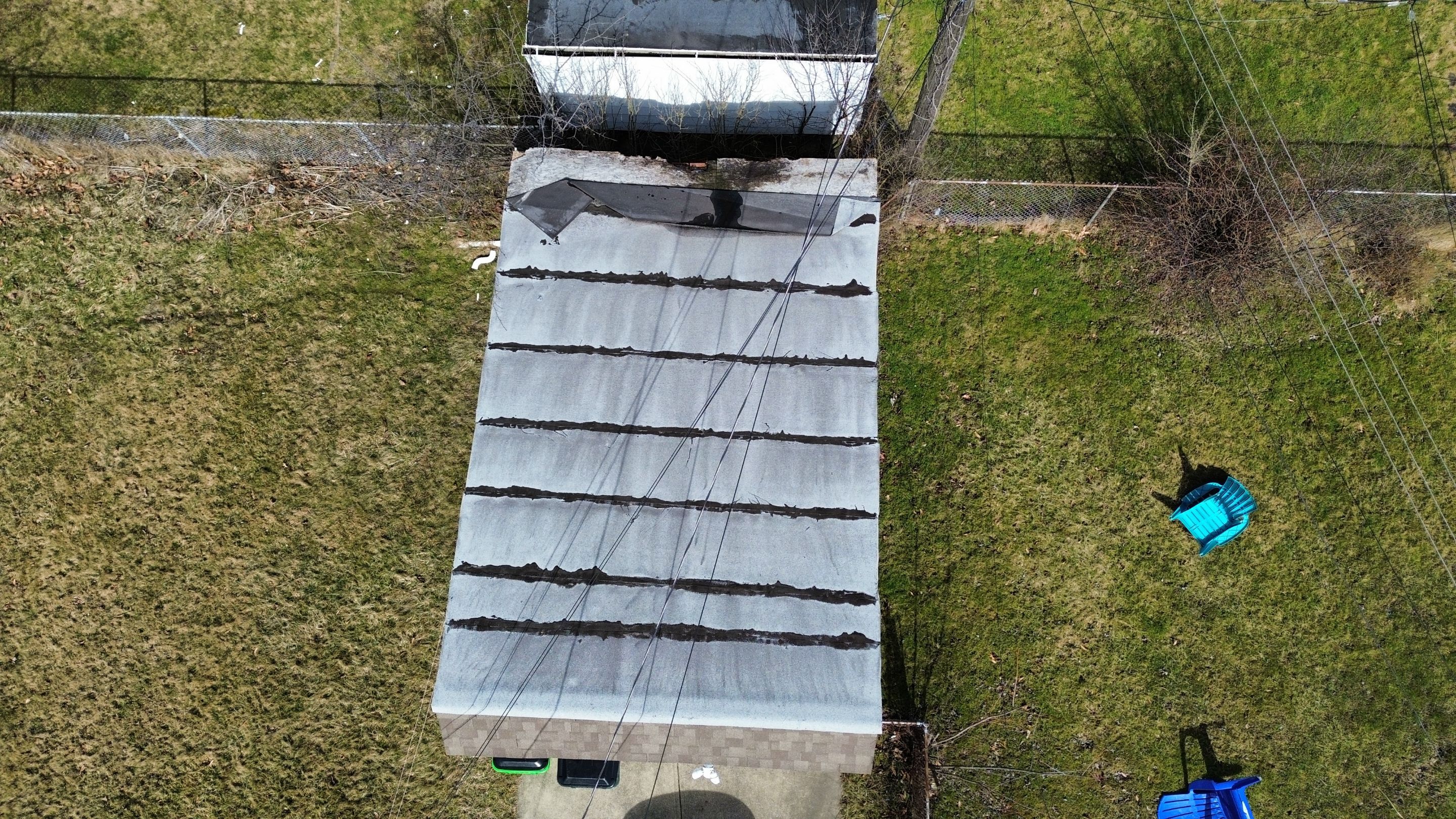 Detached Garage Roof and Decking Replacement by Atlas Roofing & Restoration