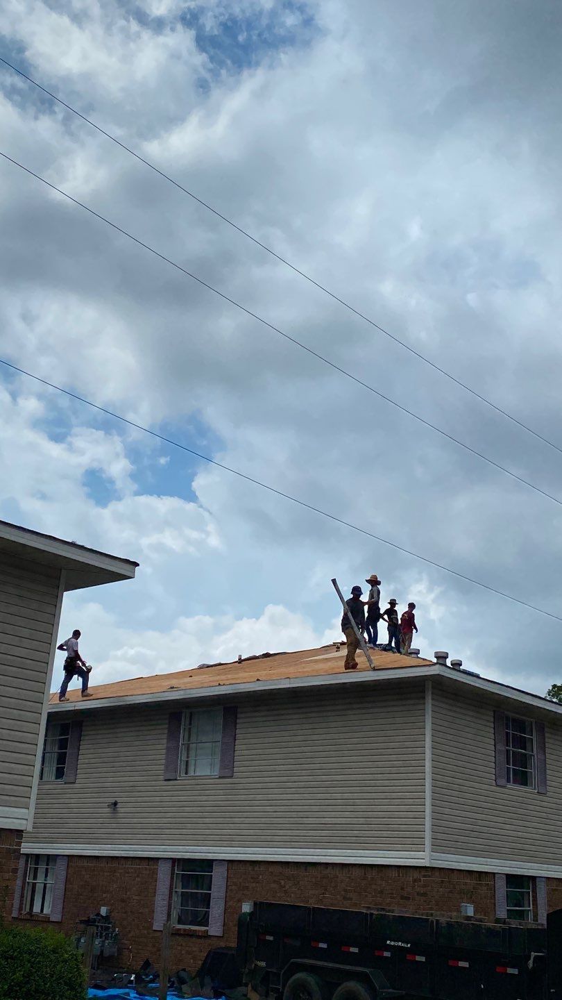 Commercial Roofing Installation using Roof Replacement by American Roofing & Construction LLC