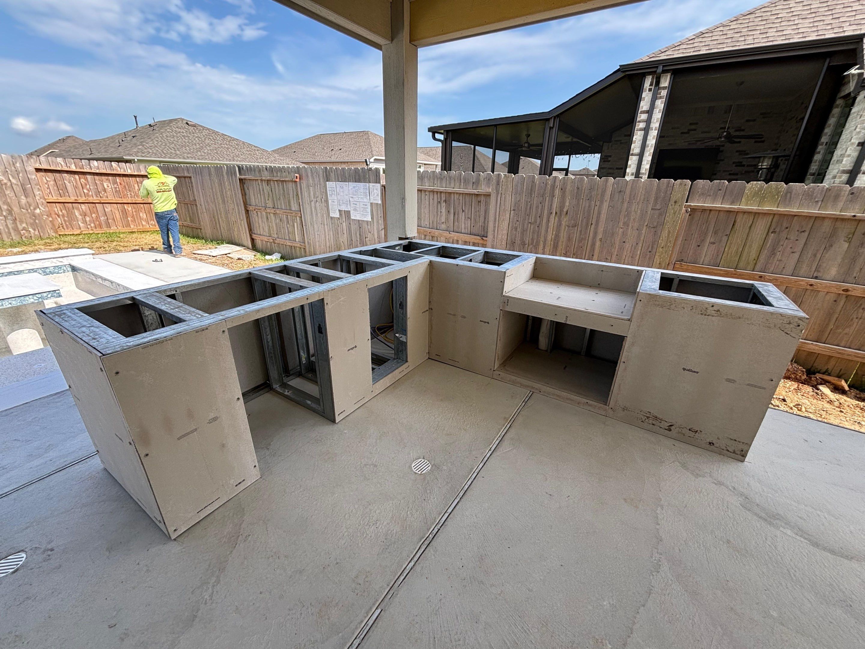 Patio and Summer Kitchen in Texas city by SophAlx LLC