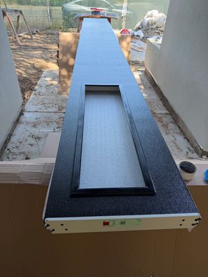Modern Black Garage Door Installation With Vertical Windows In Cupertino