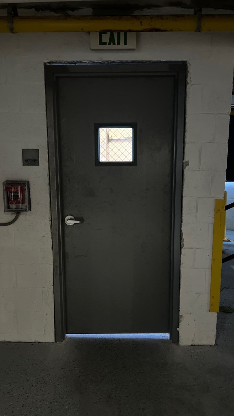 Commercial Stairwell Door Replacement & Hollow Metal Door Retrofit – Pompano Beach High-Rise by The Door Doctor of South Florida, Inc.