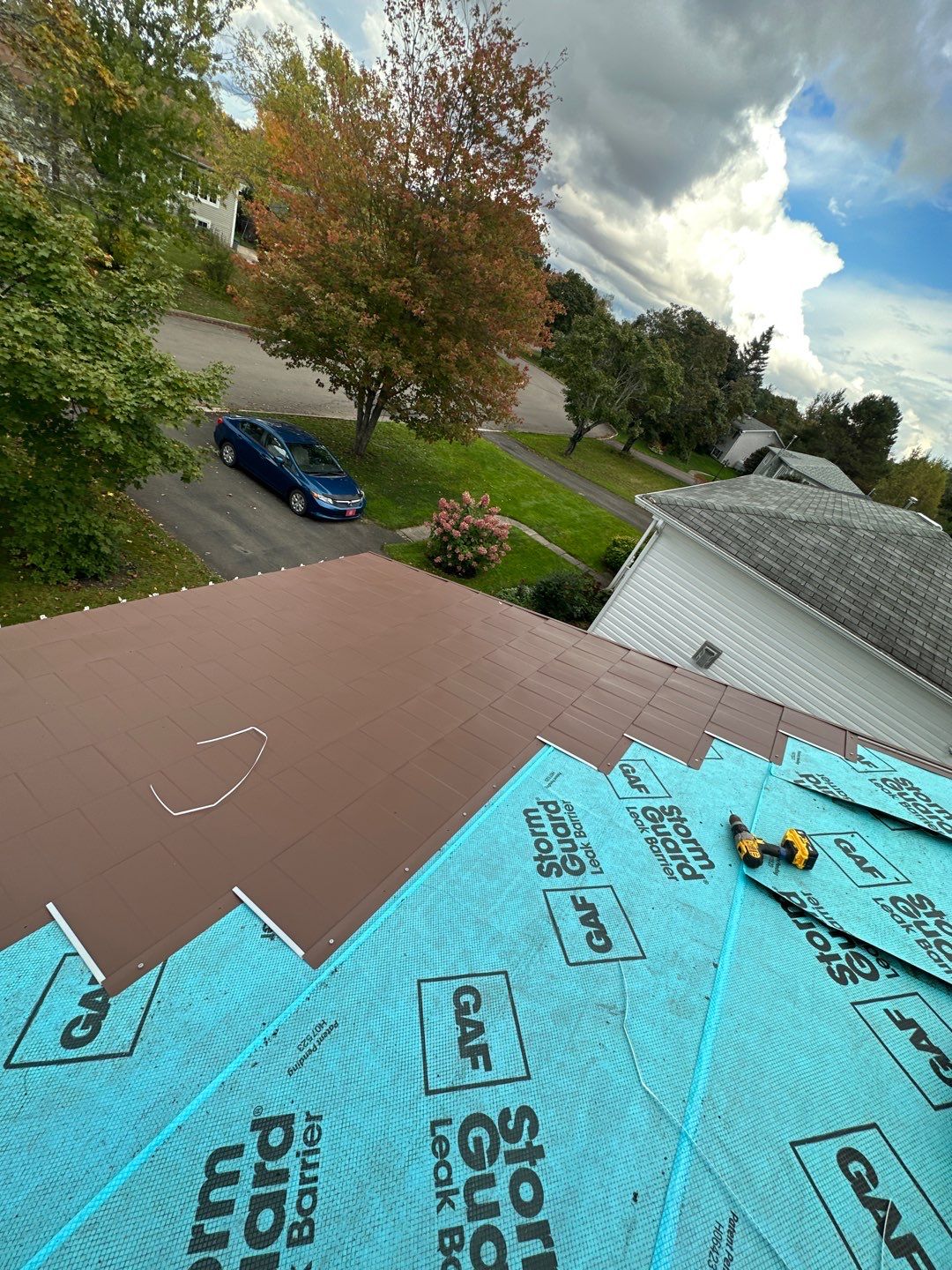 Residential Roofing Installation using Wakefield Bridge Steel Shingle by Ideal Steel by Artisan Roofing & Home Improvements Inc.