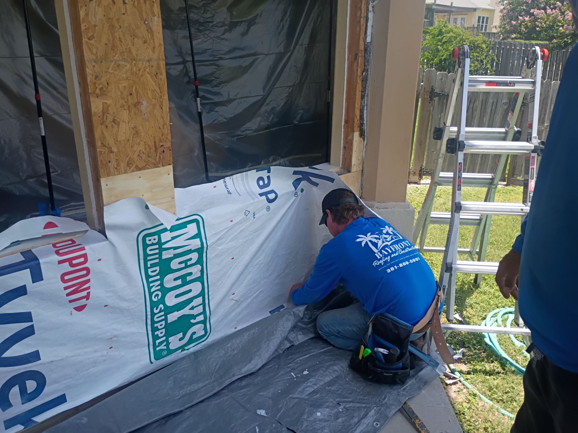 Installing Windows on a Submarine  by Bayfront Roofing and Construction