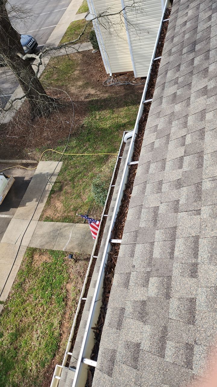 Gutter Cleaning using water by Power Wash Masters LLC