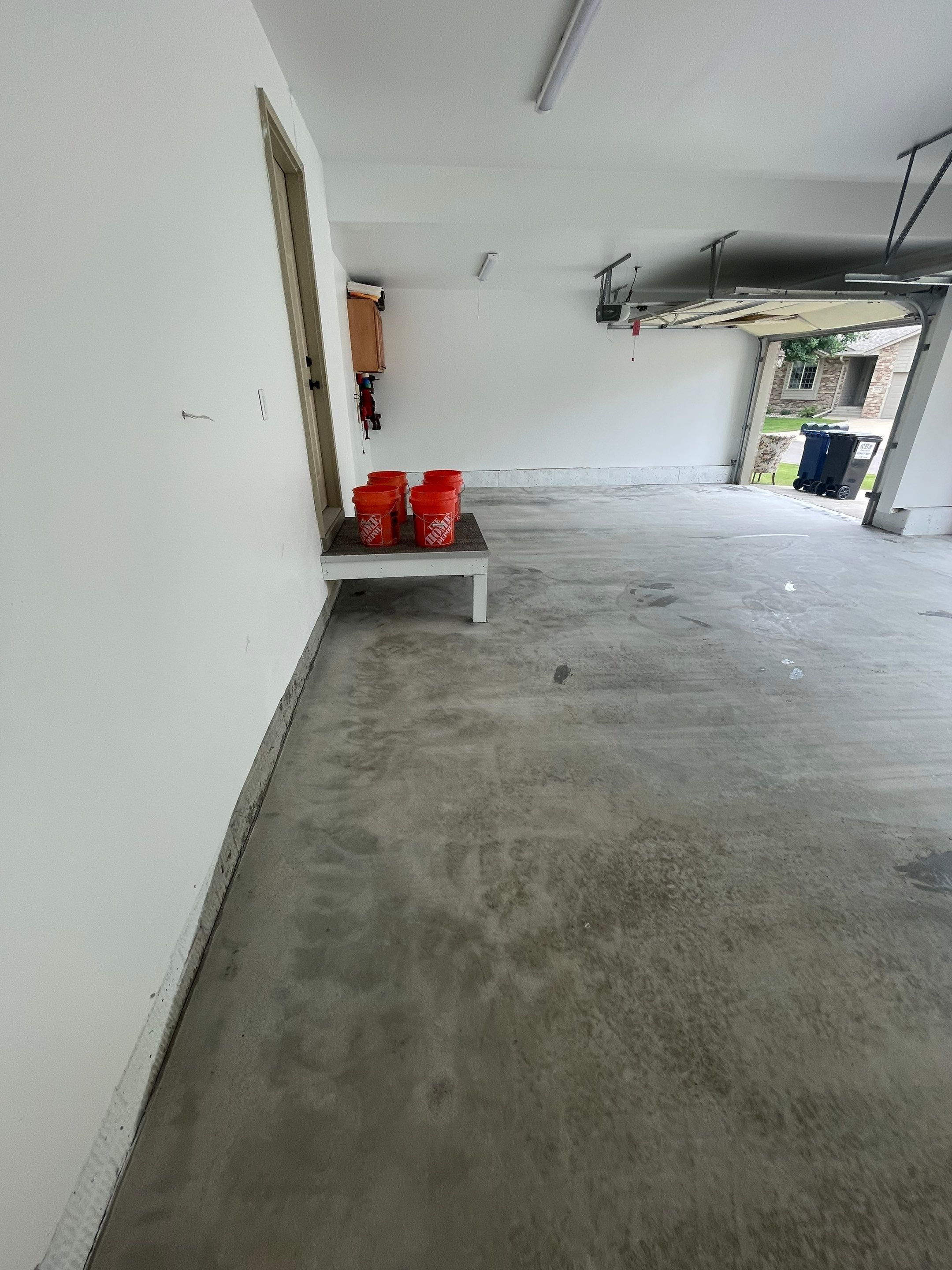 Cabin Fever Garage Floor System in Sioux Falls by Select Painting, Coatings & Garage Cabinets