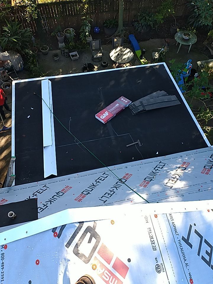 Residential Roofing Installation using Roof Replacement by American Roofing & Construction LLC