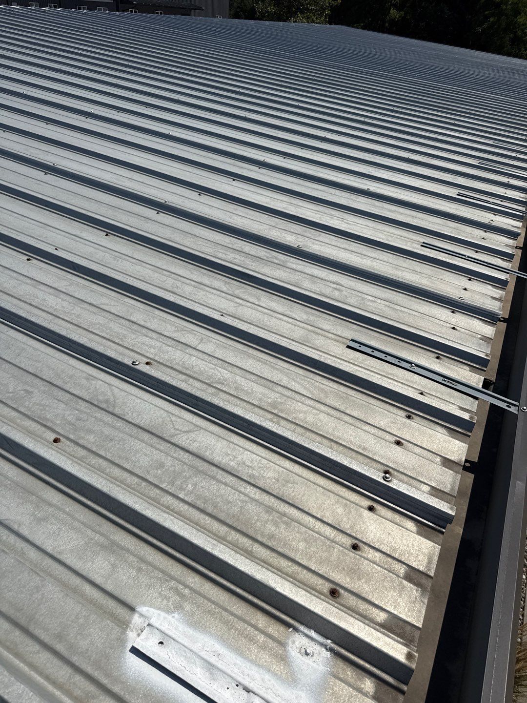 Metal Roof Fastener Replacement and Seam Sealing in West Point, NE by Crows Roofing LLC