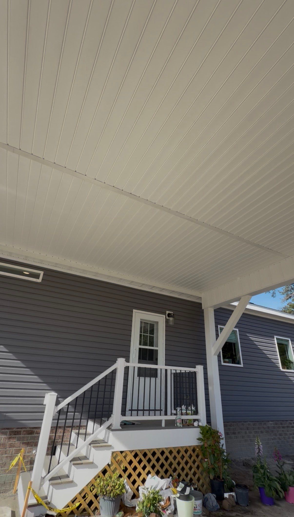 Custom Trex Covered Deck and Gabled Roof in Winterville by The Remodeling Company