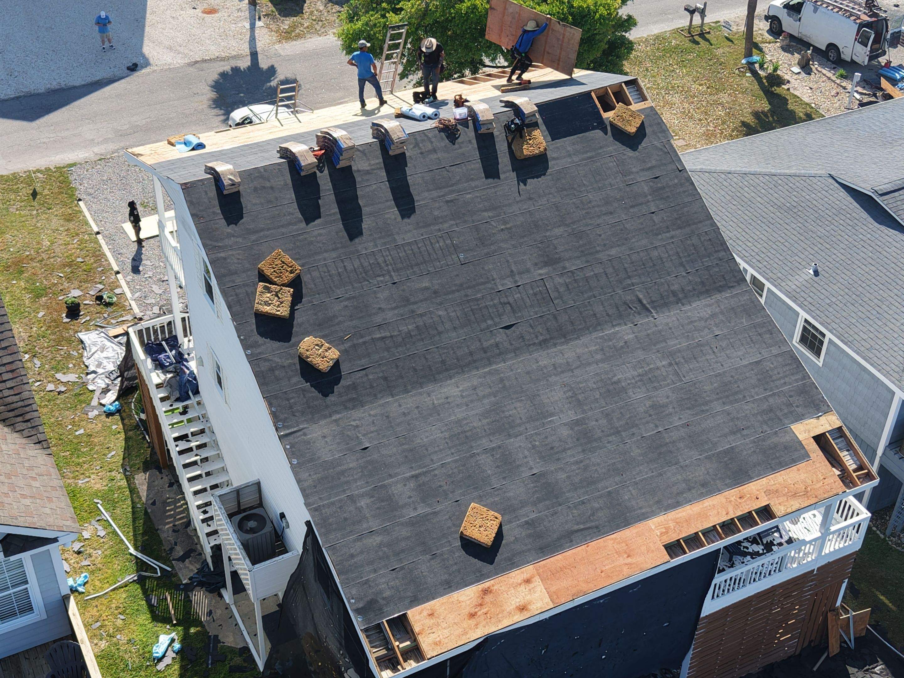 Holden Beach Canal-Side FORTIFIED Roof Replacement with Coastal Blue Shingles by RGR Construction and Roofing, LLC