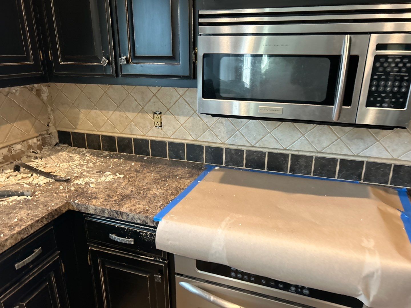 Subway tile backsplash  by Footprints Floors of Nashville
