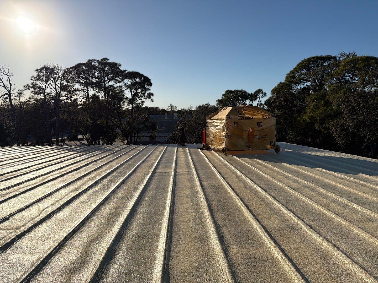 Sarasota Industrial Warehouse Metal Roof Silicone Coating Restoration by CES Roofing