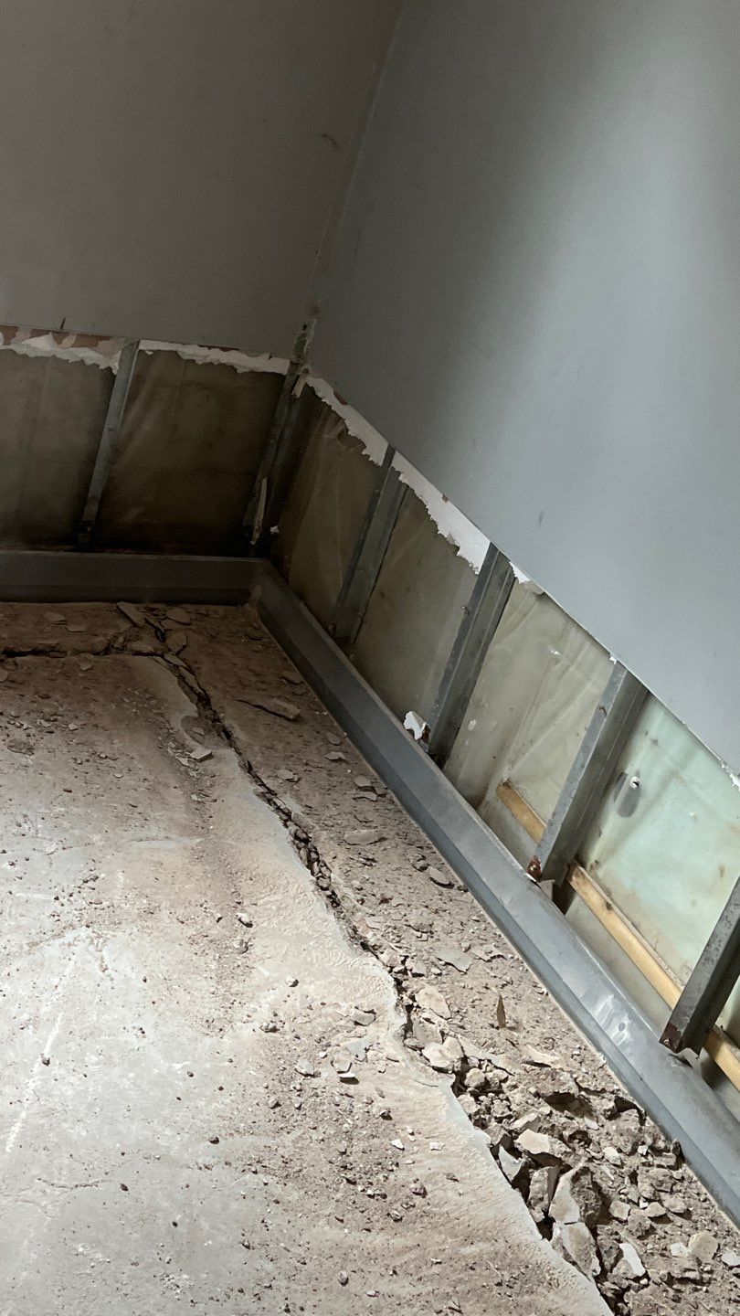 Interior drain tile system installation by ACE Waterproofing & Basement Solutions