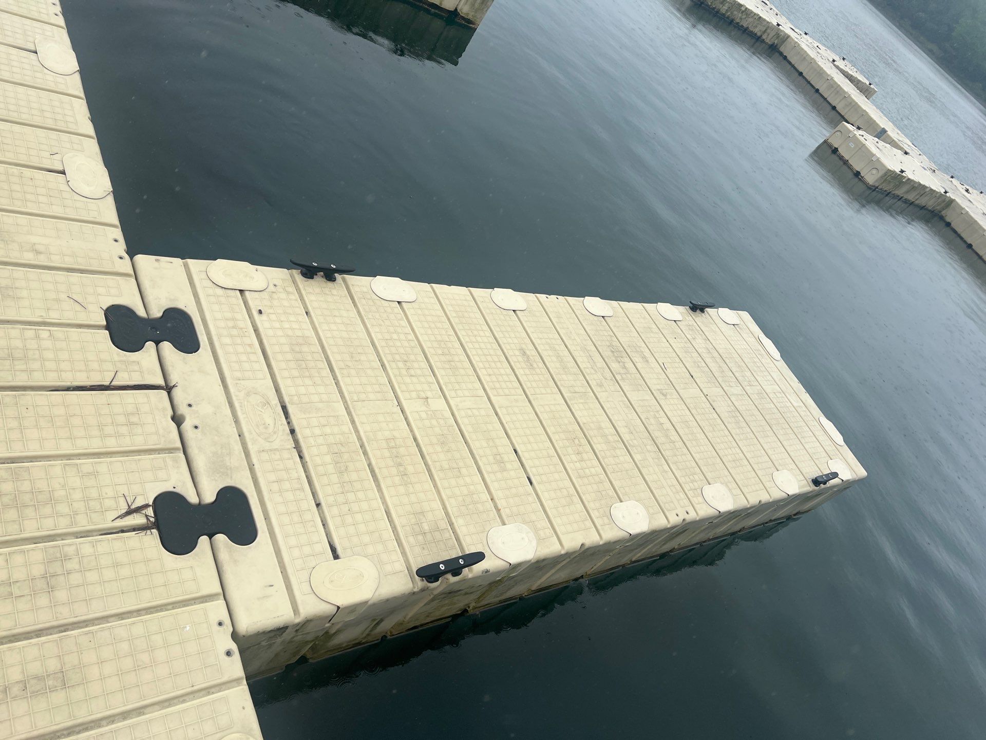 Power washing of floating dock by Northern Power Washing LLC.