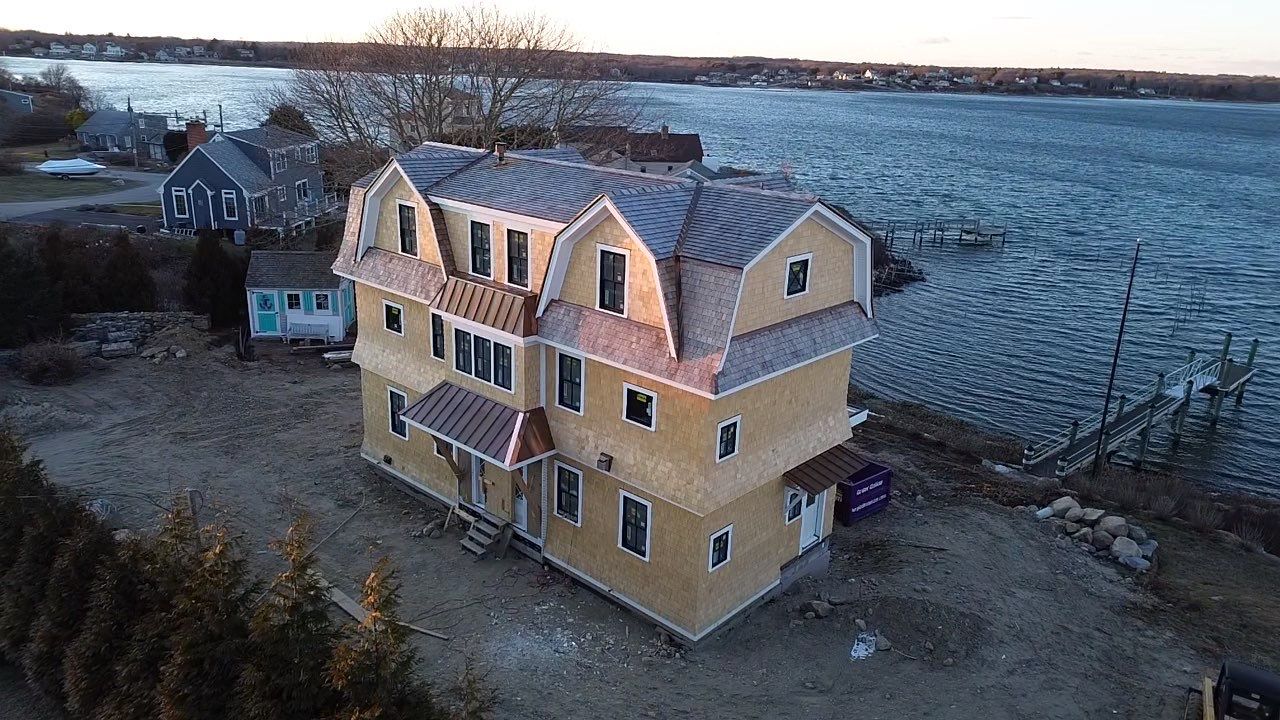 Great Island - Red Cedar Roofing, Yellow Cedar Siding, Standing Seam Copper, & Copper Gutters  by Rinaldi Brothers
