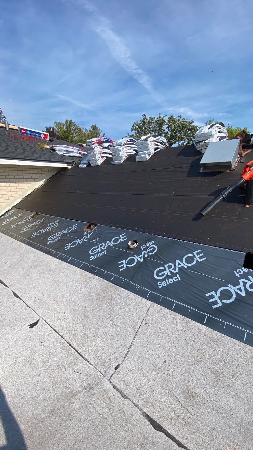 Asphalt Roof Replacement by Custom Installations