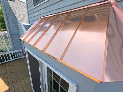 Roofing, copper chimney cap and copper awning