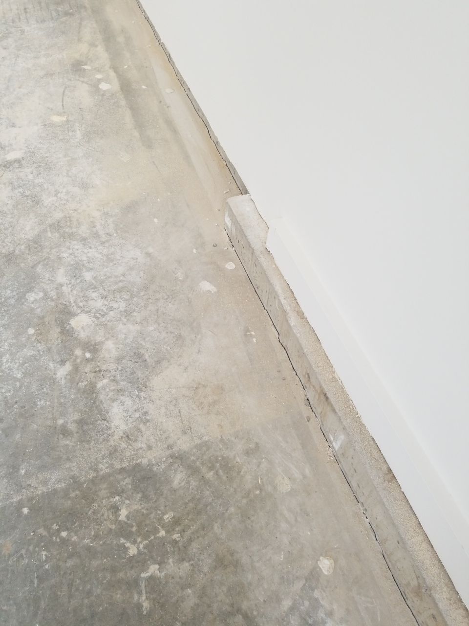 Garage Floor in Sandstone by Spectrum Painting, LLC
