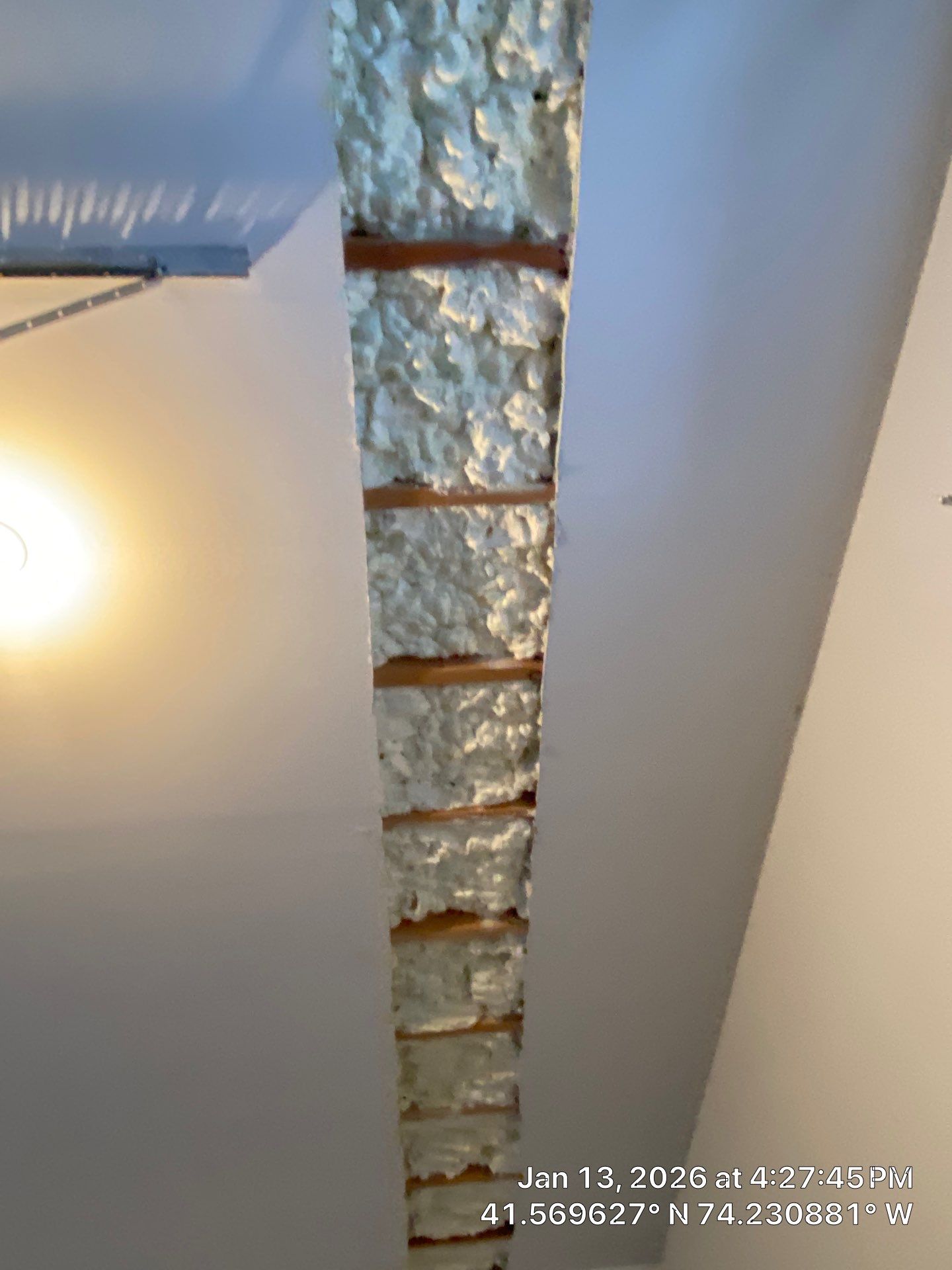 Garage ceiling using open cell spray foam by NYS Foam & Energy